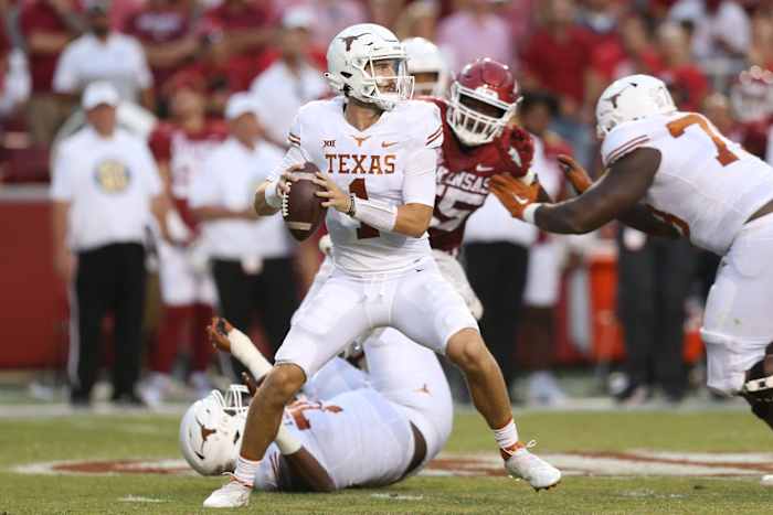 Sep 11, 2021; Fayetteville, Arkansas, USA; Texas Longhorns quarterback Hudson Card (1) looks to pass during the second quarter against the Arkansas Razorbacks at Donald W. Reynolds Razorback Stadium.